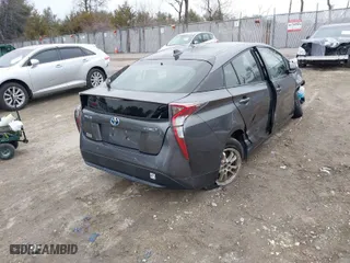 2018 Toyota Prius Two with VIN JTDKBRFU0J3063519, listed as a IAAI auction lot 41272301 with 88,084 mi miles. Bid and sale history available at carsss.com. Image 4.
