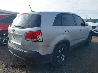 2013 Kia Sorento LX with VIN 5XYKTCA61DG405806, listed as a IAAI auction lot 41966976 with 129,942 mi miles and . Bid and sale history available at DreamBid. Image 12.