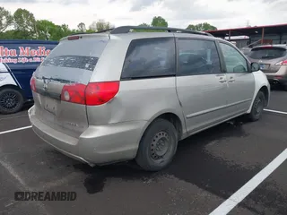 2006 Toyota Sienna CE with VIN 5TDZA23C16S451790, listed as a IAAI auction lot 42110421 with 201,749 mi miles. Bid and sale history available at carsss.com. Image 4.