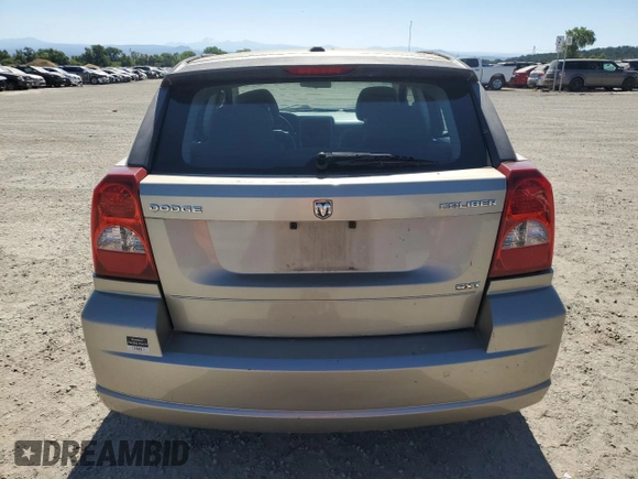 2010 Dodge Caliber SXT z VIN 1B3CB4HA7AD571525, wystawiony jako Copart lot #61651405 z przebiegiem 188 383 mil mil oraz Czysty tytuł • Clean title. Historia ofert i sprzedaży dostępna na DreamBid. Obrazek 6.