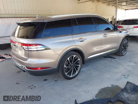 2020 Lincoln Aviator Reserve with VIN 5LM5J7XC0LGL10343, listed as a IAAI auction lot 42486201 with 62,418 mi miles and . Bid and sale history available at DreamBid. Image 4.