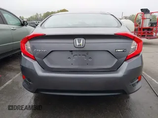 2017 Honda Civic LX z VIN 19XFC2F53HE023730, wystawiony jako IAAI lot #41885003 z przebiegiem 129 595 mil mil oraz . Historia ofert i sprzedaży dostępna na DreamBid. Obrazek 16.