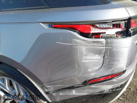 2020 Land Rover Range Rover Velar S z VIN SALYB2EXXLA295307, wystawiony jako IAAI lot #41971330 z przebiegiem 12 192 mil mil oraz . Historia ofert i sprzedaży dostępna na DreamBid. Obrazek 17.