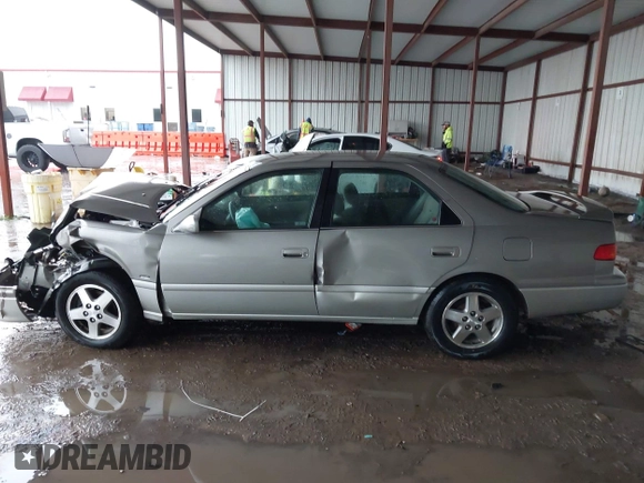 2001 Toyota Camry CE z VIN JT2BG22K410544168, wystawiony jako IAAI lot #42201412 z przebiegiem 158 500 mil mil oraz . Historia ofert i sprzedaży dostępna na DreamBid. Obrazek 14.