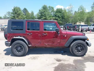 2008 Jeep Wrangler Unlimited X with VIN 1J4GA39178L646701, listed as a IAAI auction lot 42507361 with 171,153 mi miles and . Bid and sale history available at DreamBid. Image 13.