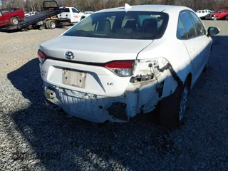 2021 Toyota Corolla LE with VIN JTDEPMAE9MJ118938, listed as a IAAI auction lot 41152722 with 107,911 mi miles. Bid and sale history available at carsss.com. Image 6.