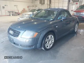 2003 Audi TT with VIN TRUTC28N431005447, listed as a IAAI auction lot 41798545 with 216,733 mi miles. Bid and sale history available at carsss.com. Image 2.