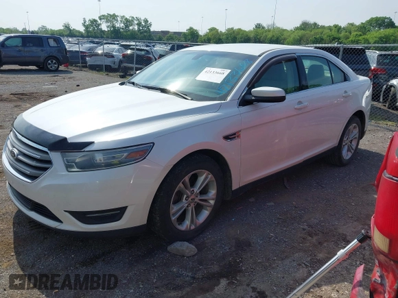 2014 Ford Taurus SEL with VIN 1FAHP2E84EG141795, listed as a IAAI auction lot 42133668 with 154,009 mi miles and . Bid and sale history available at DreamBid. Image 2.