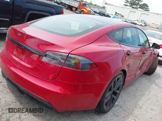 2022 Tesla Model S with VIN 5YJSA1E58NF470737, listed as a IAAI auction lot 42035040 with 15,224 mi miles and . Bid and sale history available at DreamBid. Image 4.