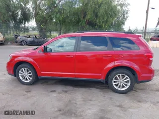 2016 Dodge Journey SXT with VIN 3C4PDDBG9GT163294, listed as a IAAI auction lot 41939520 with 166,001 mi miles. Bid and sale history available at carsss.com. Image 14.
