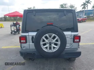 2023 Jeep Wrangler Sport S with VIN 1C4HJXDNXPW702199, listed as a IAAI auction lot 41859413 with 24,942 mi miles and . Bid and sale history available at DreamBid. Image 16.