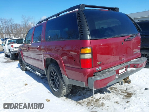 2004 Chevrolet Suburban Z71 with VIN 3GNFK16Z84G231091, listed as a IAAI auction lot 41595885 with 101,243 mi miles. Bid and sale history available at carsss.com. Image 3.