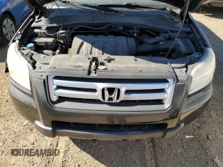 2006 Honda Pilot EX with VIN 5FNYF18466B003168, listed as a Copart auction lot 73733044 with 174,729 mi miles and Salvage Title. Bid and sale history available at DreamBid. Image 12.