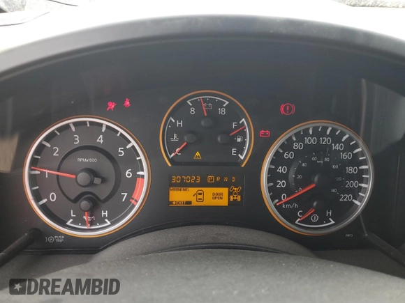 2008 Nissan Titan XE z VIN 1N6AA07C08N301414, wystawiony jako Copart lot #65863554 z przebiegiem 307 023 mil mil oraz Szkoda całkowita • Salvage title. Historia ofert i sprzedaży dostępna na DreamBid. Obrazek 9.