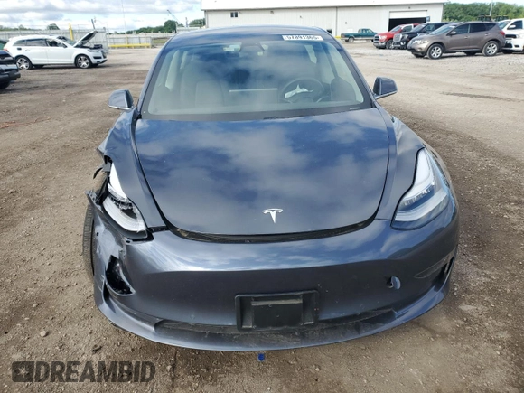 2020 Tesla Model 3 Long Range z VIN 5YJ3E1EB2LF616464, wystawiony jako Copart lot #57891365 z przebiegiem 21 197 mil mil oraz Szkoda całkowita • Salvage title. Historia ofert i sprzedaży dostępna na DreamBid. Obrazek 5.