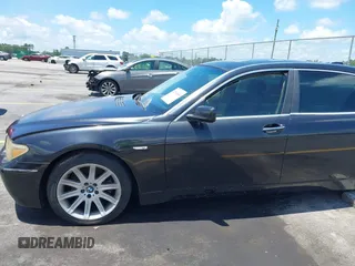 2005 BMW 7 Series 745Li with VIN WBAGN63545DS59212, listed as a IAAI auction lot 42510606 with 124,395 mi miles and . Bid and sale history available at DreamBid. Image 21.