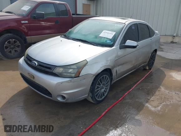 2011 Ford Focus SES with VIN 1FAHP3GN2BW196398, listed as a IAAI auction lot 41940344 with 116,482 mi miles. Bid and sale history available at carsss.com. Image 2.