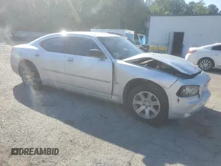 2006 Dodge Charger z VIN 2B3KA43G86H528185, wystawiony jako Copart lot #58007605 z przebiegiem 266 197 mil mil oraz Szkoda całkowita • Salvage title. Historia ofert i sprzedaży dostępna na DreamBid. Obrazek 4.