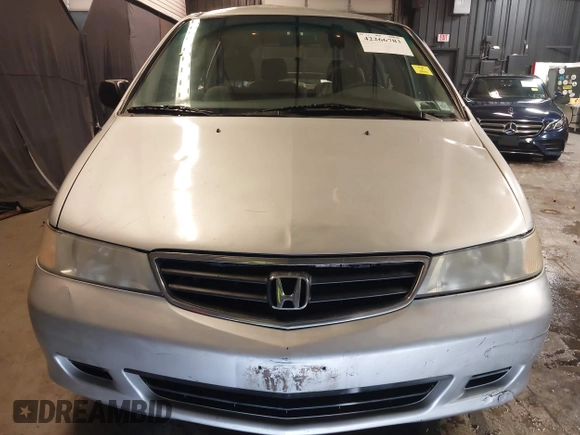 2002 Honda Odyssey LX z VIN 2HKRL18532H573727, wystawiony jako IAAI lot #42266783 z przebiegiem 127 491 mil mil oraz . Historia ofert i sprzedaży dostępna na DreamBid. Obrazek 13.
