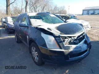 2016 Cadillac SRX Luxury Collection z VIN 3GYFNBE38GS585949, wystawiony jako IAAI lot #41413583 z przebiegiem 98 201 mil mil oraz . Historia ofert i sprzedaży dostępna na DreamBid. Obrazek 1.