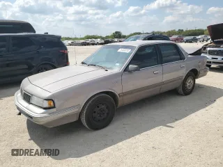 1996 Oldsmobile Cutlass Ciera 1SA VX5 z VIN 1G3AJ55M2T6354131, wystawiony jako Copart lot #74458314 z przebiegiem 55 998 mil mil oraz Szkody całkowita. Historia ofert i sprzedaży dostępna na DreamBid. Obrazek 1.