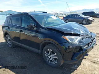 2017 Toyota RAV4 LE with VIN 2T3BFREV2HW543163, listed as a IAAI auction lot 41875755 with 96,398 mi miles and . Bid and sale history available at carsss.com. Image 1.
