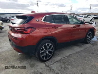 2021 BMW X2 sDrive28i with VIN WBXYH9C09M5S52059, listed as a Copart auction lot 41196404 with 10,506 mi miles. Bid and sale history available at carsss.com. Image 3.