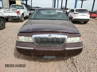 2001 Mercury Grand Marquis LS с VIN 2MEFM75W81X667940, выставлен на аукционе Copart как лот 48027015 с пробегом 121 967 миль миль и Списание • Salvage title. История ставок и продаж доступна на DreamBid. Изображение 5.