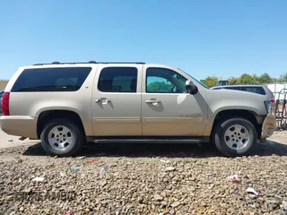 2012 Chevrolet Suburban LT z VIN 1GNSCJE03CR128206, wystawiony jako IAAI lot #42002119 z przebiegiem 329 078 mil mil oraz . Historia ofert i sprzedaży dostępna na DreamBid. Obrazek 13.