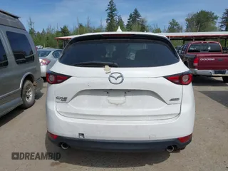 2018 Mazda CX-5 Grand Touring with VIN JM3KFBDM1J0309260, listed as a IAAI auction lot 42247237 with Not Provided miles and . Bid and sale history available at DreamBid. Image 16.