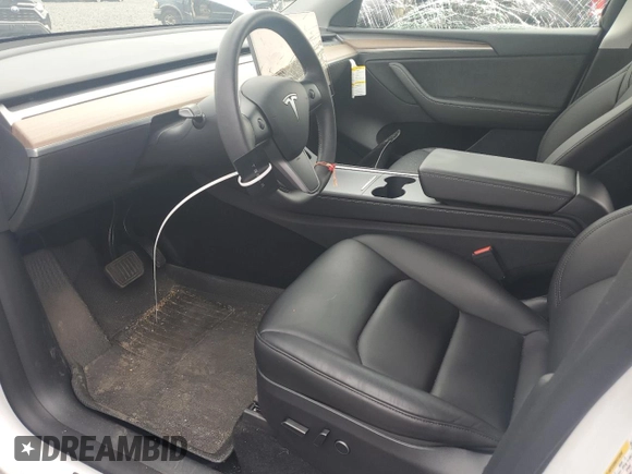 2023 Tesla Model Y Long Range with VIN 7SAYGDEE0PF746778, listed as a Copart auction lot 52704965 with 19,047 mi miles and Salvage Title. Bid and sale history available at DreamBid. Image 7.
