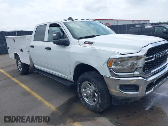 2024 Ram 2500 Tradesman with VIN 3C6UR5HJ1RG114588, listed as a IAAI auction lot 41923877 with 1,800 mi miles and . Bid and sale history available at DreamBid. Image 1.