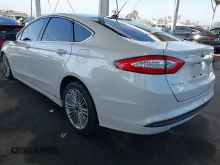 2013 Ford Fusion SE Hybrid z VIN 3FA6P0LU1DR310075, wystawiony jako IAAI lot #42085556 z przebiegiem Nie podano mil oraz . Historia ofert i sprzedaży dostępna na DreamBid. Obrazek 3.