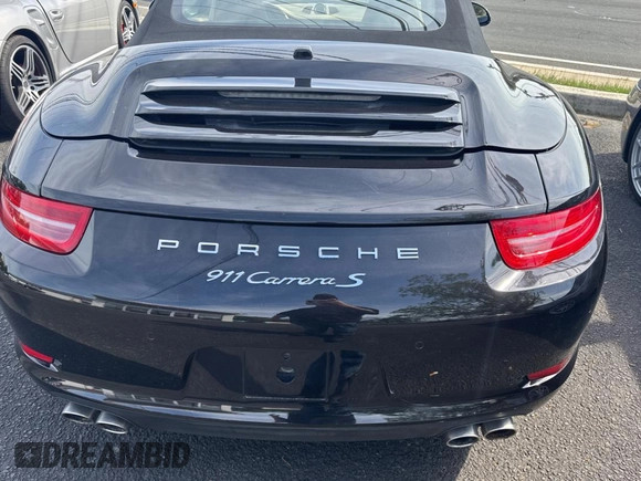 2013 Porsche 911 Carrera S with VIN WP0CB2A97DS154165, listed as a Copart auction lot 56958415 with 99,999 mi miles and Salvage Title. Bid and sale history available at DreamBid. Image 7.