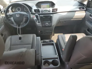 2014 Honda Odyssey Touring with VIN 5FNRL5H91EB015162, listed as a Copart auction lot 60643135 with 176,898 mi miles and Salvage title. Bid and sale history available at DreamBid. Image 8.