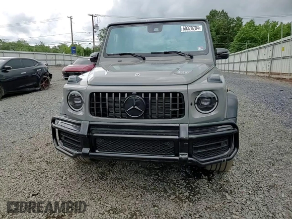 2023 Mercedes-Benz G 63 AMG z VIN W1NYC7HJ3PX477936, wystawiony jako Copart lot #60379704 z przebiegiem 2 858 mil mil oraz Szkoda całkowita • Salvage title. Historia ofert i sprzedaży dostępna na DreamBid. Obrazek 12.