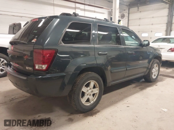 2007 Jeep Grand Cherokee Laredo with VIN 1J8GS48K87C615693, listed as a IAAI auction lot 41949521 with 206,058 mi miles. Bid and sale history available at carsss.com. Image 4.