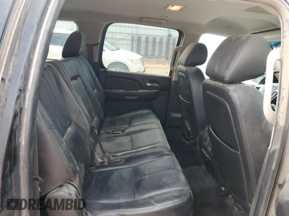 2012 Chevrolet Suburban LT z VIN 1GNSKJE79CR191794, wystawiony jako Copart lot #53699425 z przebiegiem 129 264 mil mil oraz Czysty tytuł • Clean title. Historia ofert i sprzedaży dostępna na DreamBid. Obrazek 10.