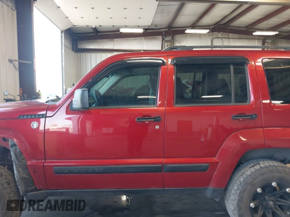 2008 Jeep Liberty Sport with VIN 1J8GN28K78W184372, listed as a IAAI auction lot 42051566 with 168,806 mi miles. Bid and sale history available at carsss.com. Image 15.