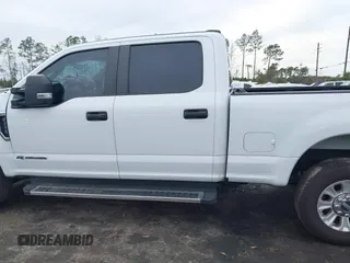 2022 Ford F-250 XL z VIN 1FT7W2BTXNEF76074, wystawiony jako IAAI lot #41339363 z przebiegiem 70 594 mil mil oraz . Historia ofert i sprzedaży dostępna na DreamBid. Obrazek 14.