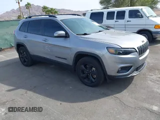 2021 Jeep Cherokee Altitude with VIN 1C4PJMLBXMD157985, listed as a IAAI auction lot 41916748 with 71,401 mi miles. Bid and sale history available at carsss.com. Image 1.