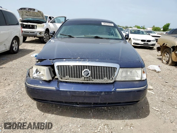 2004 Mercury Grand Marquis GS z VIN 2MEFM74W64X603871, wystawiony jako Copart lot #56545655 z przebiegiem 206 427 mil mil oraz Szkoda całkowita • Salvage title. Historia ofert i sprzedaży dostępna na DreamBid. Obrazek 5.