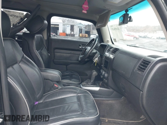 2008 Hummer H3 SUV Alpha with VIN 5GTEN63L388197946, listed as a IAAI auction lot 41695619 with 198,631 mi miles. Bid and sale history available at carsss.com. Image 5.
