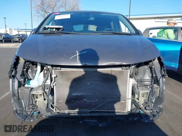 2015 Honda Odyssey EX-L with VIN 5FNRL5H61FB126933, listed as a IAAI auction lot 42003978 with 69,025 mi miles and . Bid and sale history available at carsss.com. Image 6.