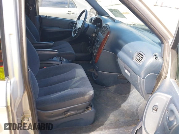 2003 Chrysler Town & Country LX with VIN 2C4GP44L03R203678, listed as a IAAI auction lot 41293296 with 210,827 mi miles and . Bid and sale history available at DreamBid. Image 5.