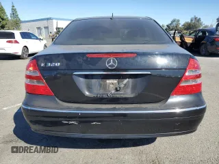 2003 Mercedes-Benz E-Class 3.2L with VIN WDBUF65J23A108105, listed as a Copart auction lot 79939884 with 238,172 mi miles and Salvage Title. Bid and sale history available at carsss.com. Image 6.