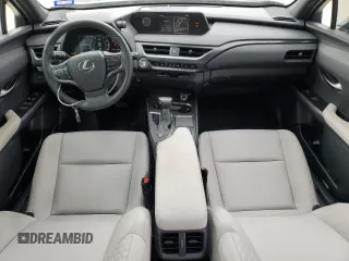 2022 Lexus UX 200 z VIN JTHX3JBH9N2054938, wystawiony jako Copart lot #43940695 z przebiegiem 27 002 mil mil oraz Szkoda całkowita • Salvage title. Historia ofert i sprzedaży dostępna na DreamBid. Obrazek 8.