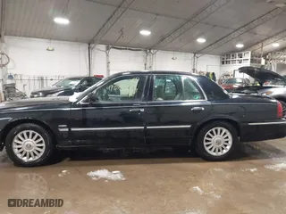 2009 Mercury Grand Marquis LS with VIN 2MEHM75V39X602084, listed as a IAAI auction lot 41615859 with 102,051 mi miles. Bid and sale history available at carsss.com. Image 14.