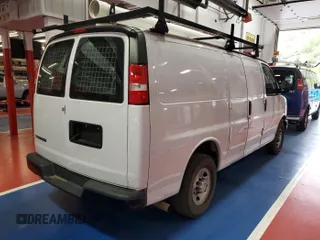 2018 Chevrolet Express Cargo with VIN 1GCWGAFG7J1339351, listed as a IAAI auction lot 42240933 with 104,706 mi miles and . Bid and sale history available at DreamBid. Image 1.