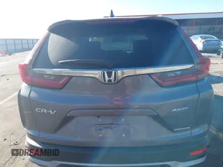 2021 Honda CR-V Touring with VIN 2HKRW2H9XMH681992, listed as a IAAI auction lot 41674120 with 43,000 mi miles. Bid and sale history available at carsss.com. Image 16.